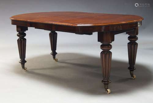 A Victorian mahogany wind up dining table, with D-ends and t...