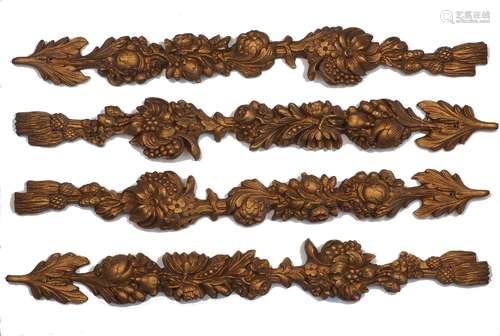 A set of four gilt composition floral wall garlands, late 20...