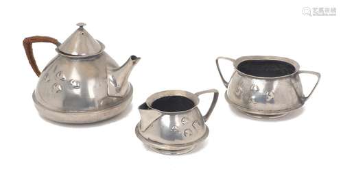 A Liberty & Co three piece tea set, circa 1905, cast in pewt...