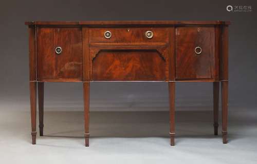 A George III style mahogany sideboard, 20th Century, with fr...