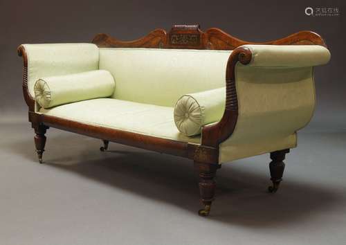 A Regency faux rosewood and brass inlaid sofa, the serpentin...