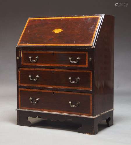 A George III style mahogany bureau, crossbanded and inlaid b...