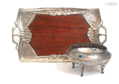 A Urania pewter and wood Art Nouveau tray, c.1900, decorated...