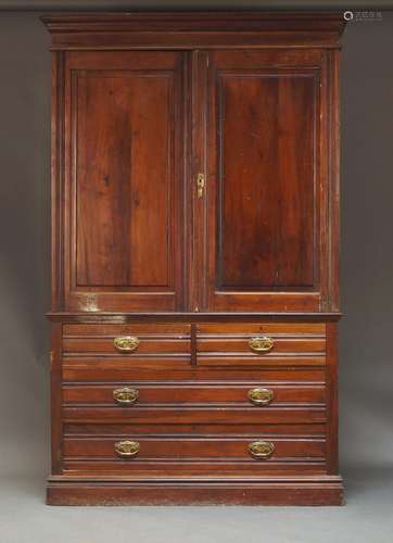 An Edwardian mahogany linen press, the moulded cornice above...