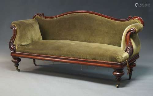 A Victorian mahogany framed chaise longue, with serpentine b...