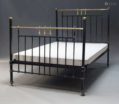 A Victorian brass and steel double bed, together with box sp...