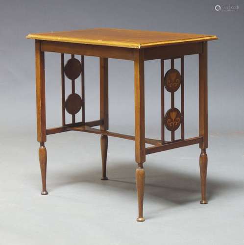 An Edwardian mahogany and inlaid side table, the rectangular...