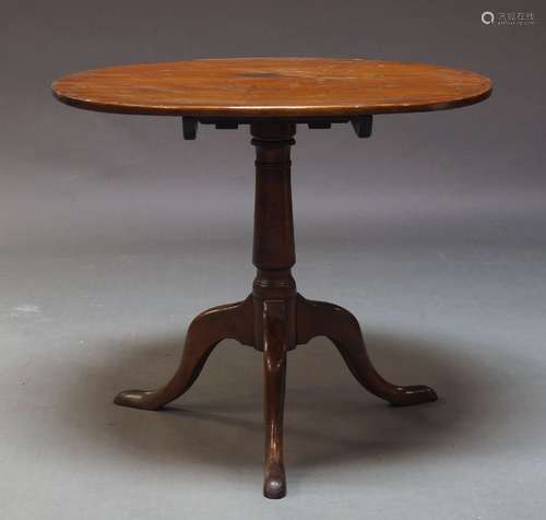 A George III mahogany tilt top occasional table, the circula...