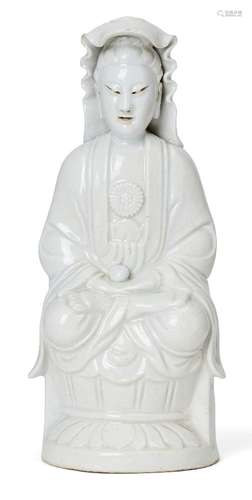 A Chinese Dehua porcelain figure of Guanyin, 19th century, s...