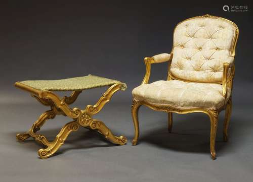 A Louis XV style gilt fauteuil, mid 20th Century, the cartou...