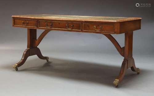 A reproduction partner’s desk, the rectangular top inset wit...