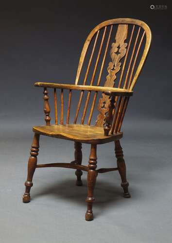 A Thames Valley elm kitchen chair, 19th Century, with hoop b...