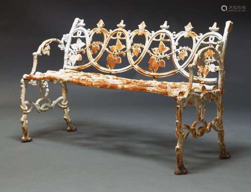 A white painted cast iron bench, possibly by Coalbookdale, e...