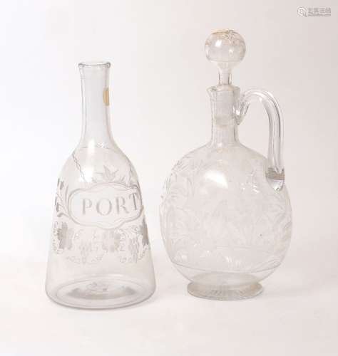 An etched glass claret jug, 19th century, decorated with flo...