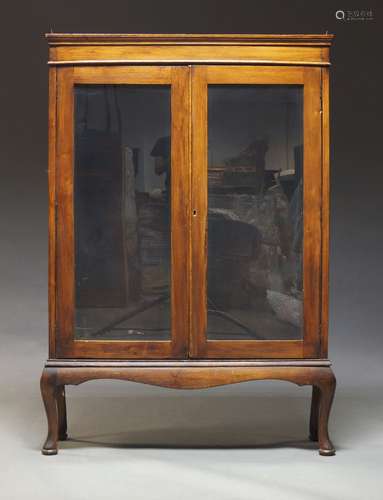 A mahogany and glazed bookcase, in the Georgian taste, early...