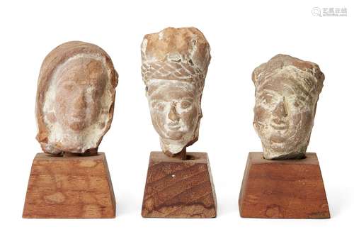 Three small sandstone carved heads, Gupta period, India, 3rd...