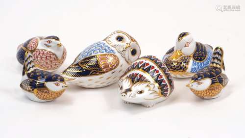 A group of Royal Crown Derby Imari paperweights, including a...