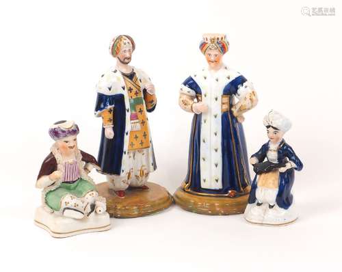 A collection of four Staffordshire style figures, 20th centu...