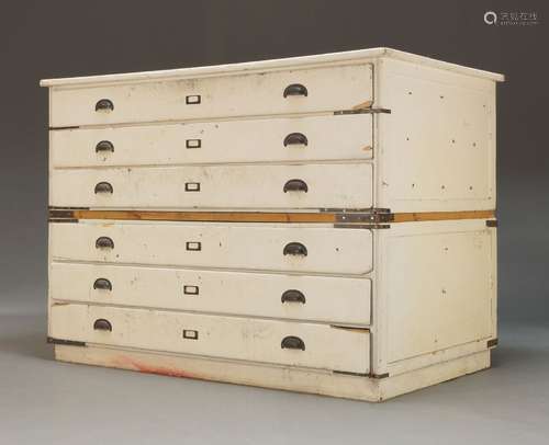 A white painted plan chest, early 20th century, in two secti...