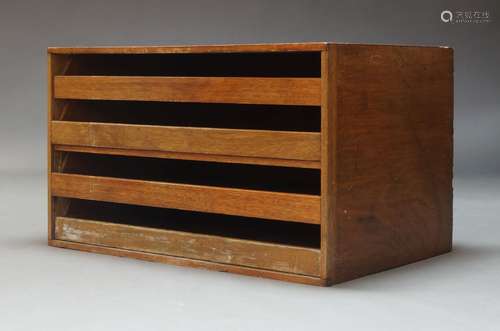 A teak plan chest, mid 20th century, with four open drawers,...