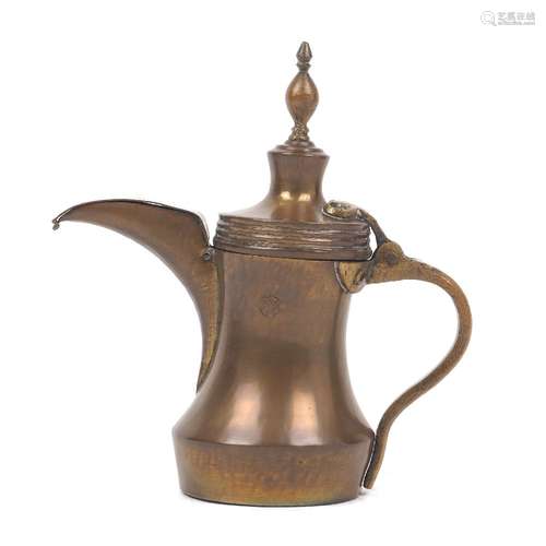 A Turkish / Islamic brass dallah coffee pot, 19th Century, t...