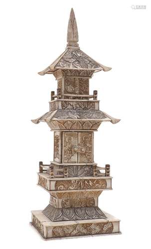 A Chinese bone two tier pagoda, early 20th century, carved w...