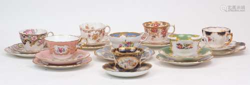 A collection of English porcelain tea cups, saucers and side...