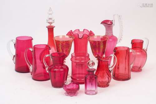 Fourteen pieces of Victorian and later cranberry glass, to i...