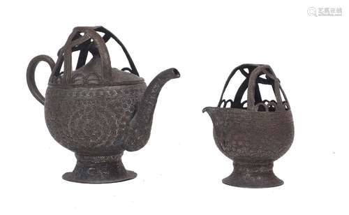 An Islamic silvered copper tea pot and jug, late 19th/20th c...