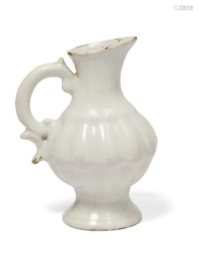 WITHDRAWN; A Holics faience jug, mid 18th century, in a whit...