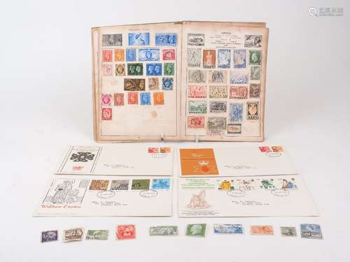 A collection of stamps, including first day covers, presente...