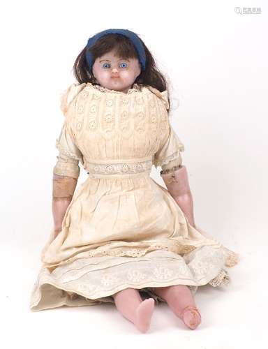 A poured wax shoulder head doll, circa 1880, with fixed blue...