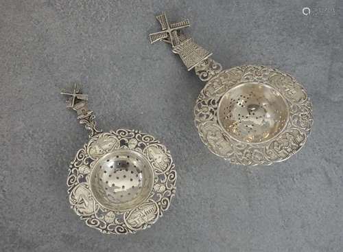 TWO SILVER TEA STRAINERS