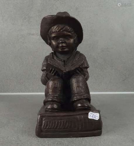 FIGURAL SCULPTURE: READING BOY