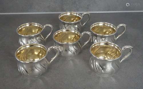 SIX SILVER CUPS