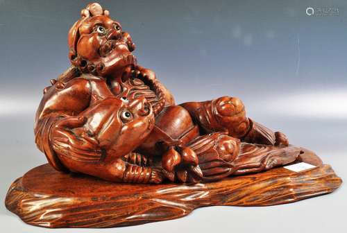 EARLY 20TH CENTURY CARVED WOOD FIGURE OF LIU HAI