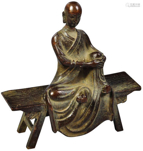 SMALL BRONZE SCULPTURE OF A SEATED MONK