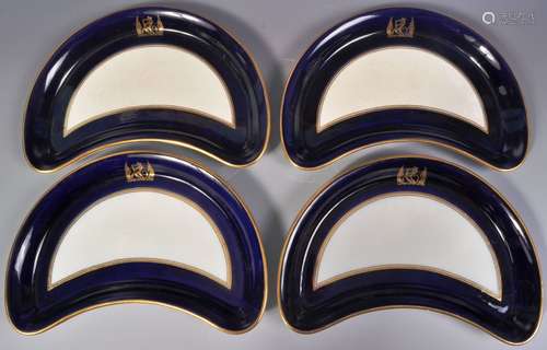 SET OF COPELAND ARMORIAL COBALT AND GILT CRESCENT SHAPED PLA...