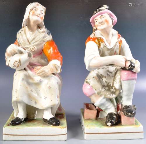 PAIR OF 19TH CENTURY STAFFORDSHIRE COBBLER FIGURES