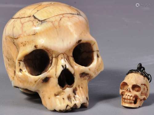 19TH CENTURY MEMENTO MORI IVORY SKULL & ANOTHER