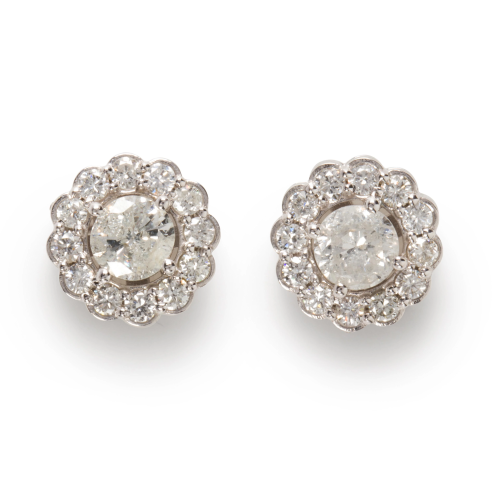 A diamond and eighteen karat white gold stud earrings