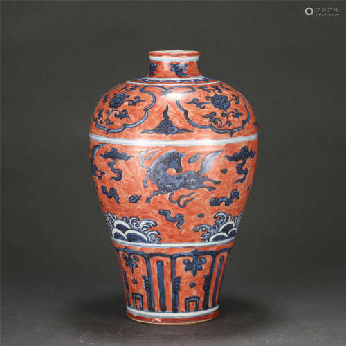 A CHINESE IRON RED GLAZE BLUE AND WHITE PORCELAIN VASE