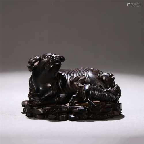 A CHINESE WOODCARVING CATTLE