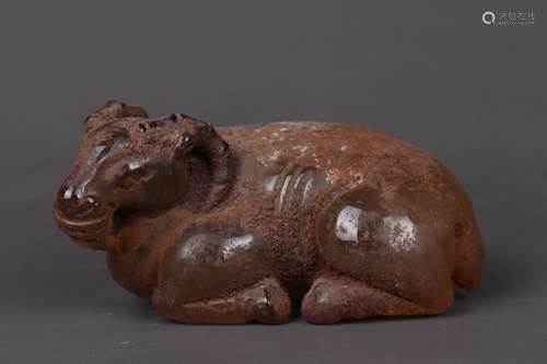 A CARVED CITRINE GLASS FIGURE OF RECUMBENT RAM