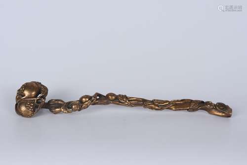 A GILT BRONZE POMEGRANATE RUYI SCEPTER