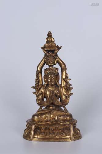 A GILT BRONZE FIGURE OF SEATED BUDDHA