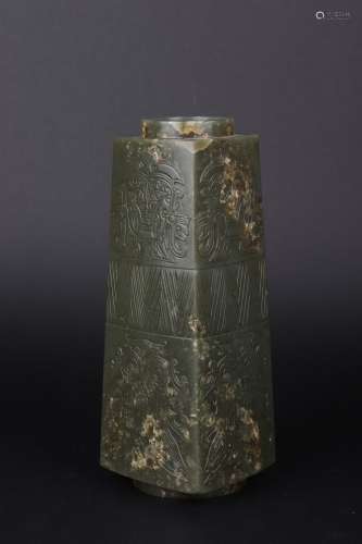 A CARVED GREENISH JADE CONG