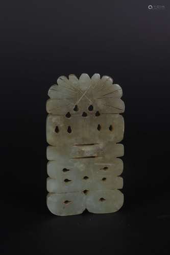 A CARVED RUSSET JADE MARRIAGE ORNAMENT