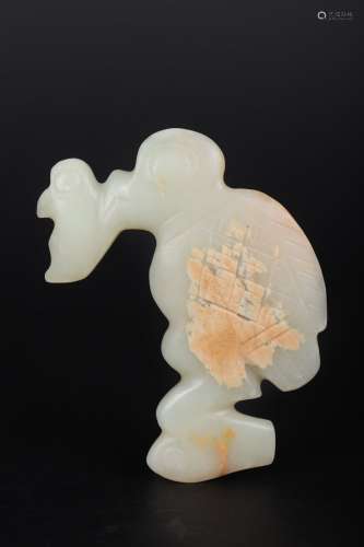 A CARVED WHITE JADE ORNAMENT