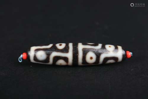 A PIECE OF DZI BEAD